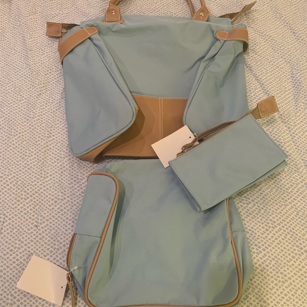 Brand new dusty blue and tan travel set